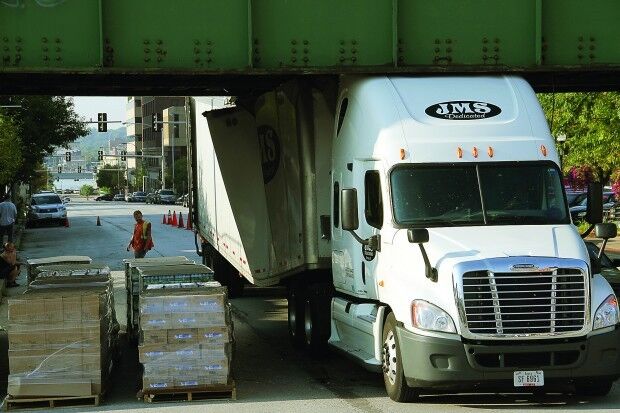 Truck hits Brady Street overpass
